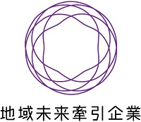 写真：握手する経済産業大臣と代表の木村俊之